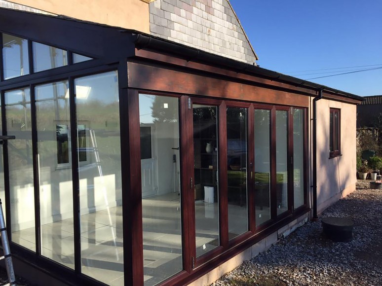 Timber-framed glazed garden room