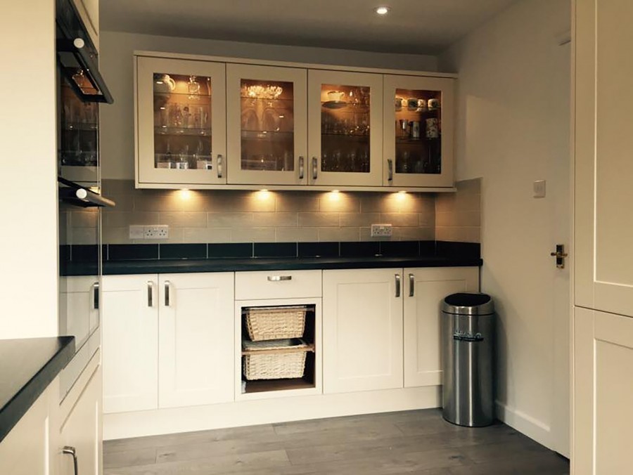 Glazed wall units with under-cabinet lighting