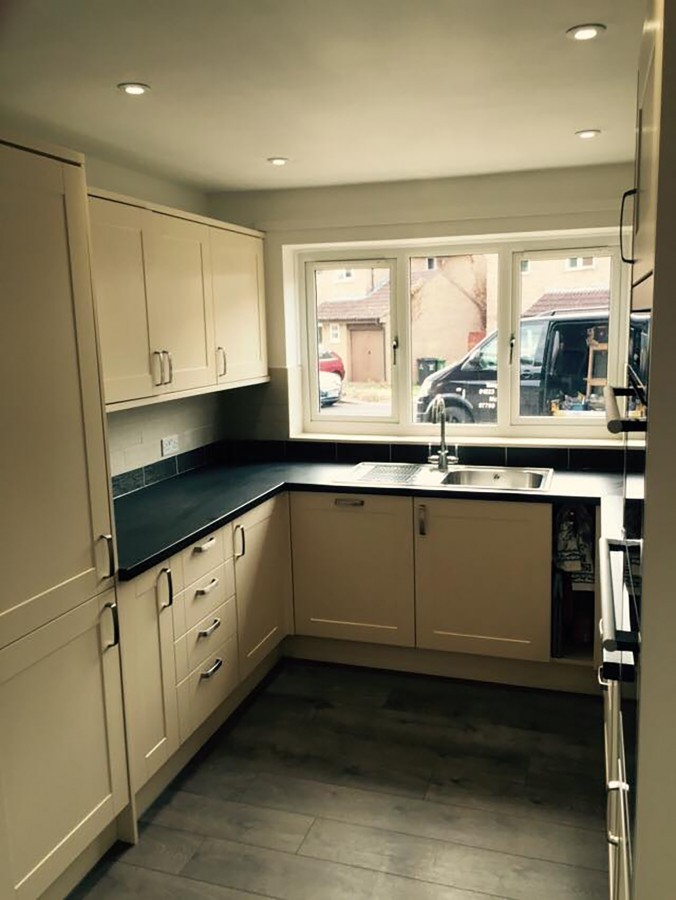 Shaker kitchen with dark worktop