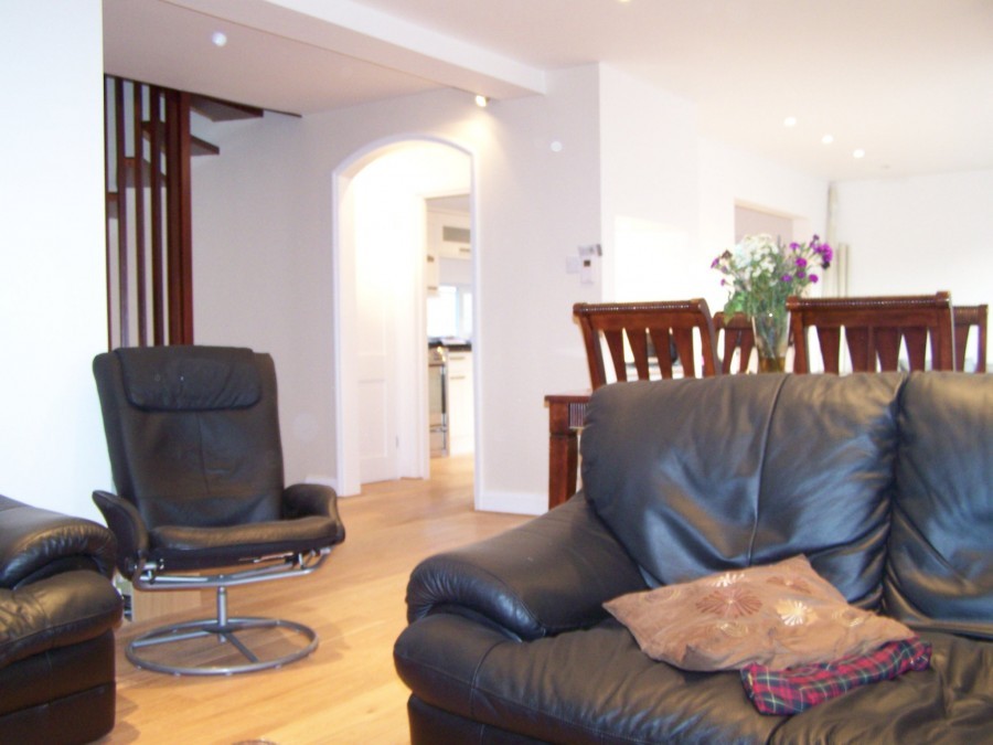 Refurbished living room with oak flooring