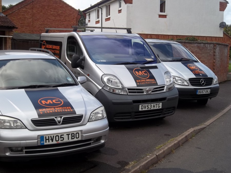 M C Building Services vans with the orange MC livery
